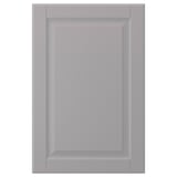 Szare drzwi szafy BODBYN z gładkim, fazowanym panelem.