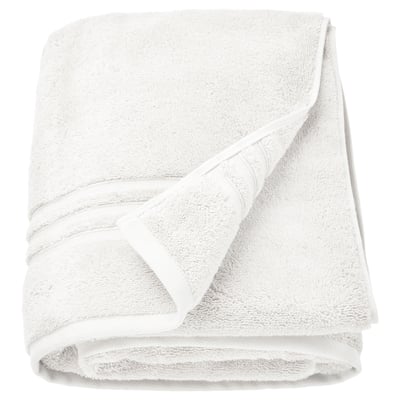 Biały ręcznik z bawełny organicznej BROKGLIM, składany, pluszowy, z elegancką obwódką.