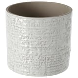 Biała ceramiczna donica CHIAFRÖN; okrągły kształt, teksturowana powierzchnia.