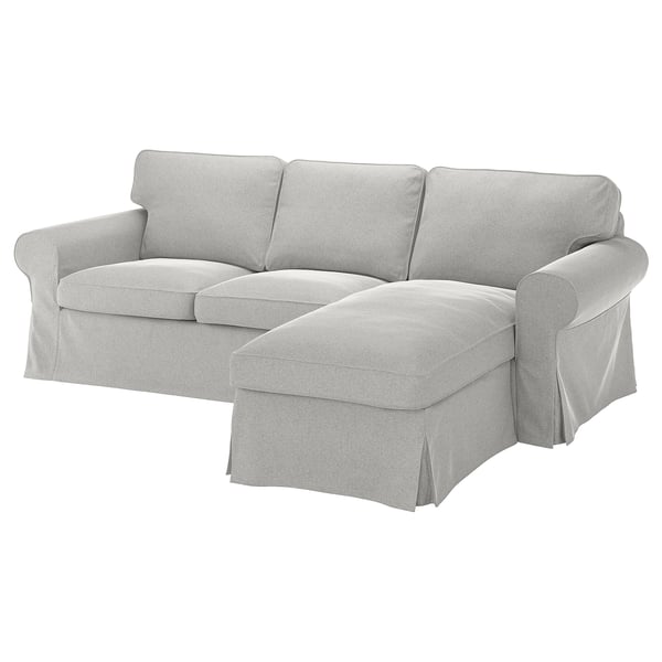 Sofa EKTORP, jasnoszara, w kształcie litery L, grube poduszki, zdejmowany pokrowiec, nowoczesny klasyczny design.