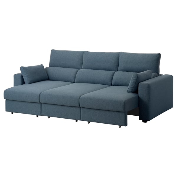Niebieska sofa ESKILSTUNA; W kształcie litery L, wysokie oparcie, pluszowy materiał, regulowane poduszki.