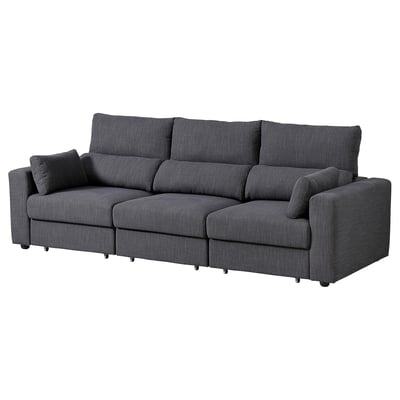 Ciemnoszara sofa ESKILSTUNA, nowoczesny design z regulowanymi sekcjami, wysokim oparciem i wygodnymi poduszkami.