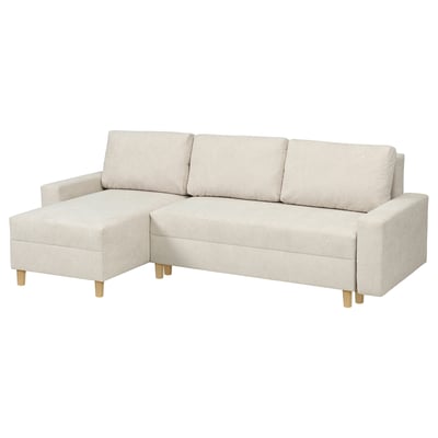 Beżowa sofa JÄRINGSHOLM w kształcie litery L, drewniane nogi, tapicerowana lekkim materiałem, nowoczesny minimalistyczny design.