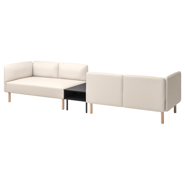 Beżowa sofa modułowa LILLEHEM z drewnianymi nogami, zaprojektowana z myślą o komforcie i możliwości adaptacji.