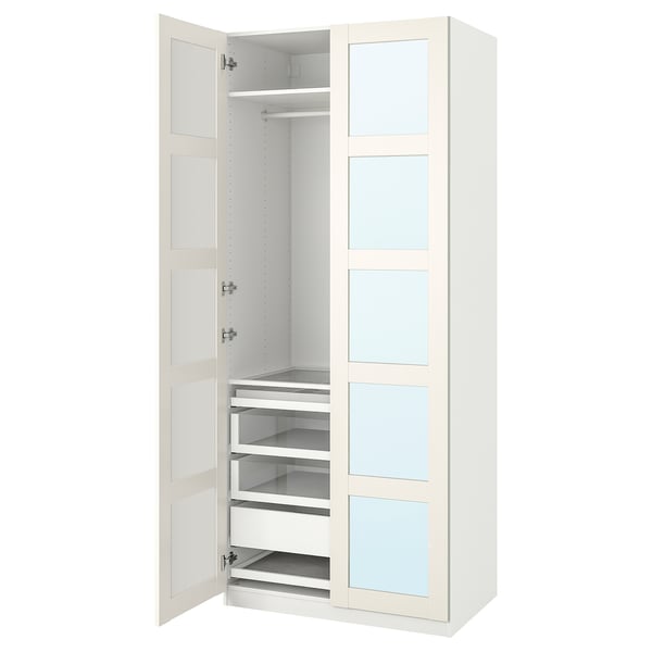 Biała szafa PAX, otwarte półki i szuflady, nowoczesny minimalistyczny design.
