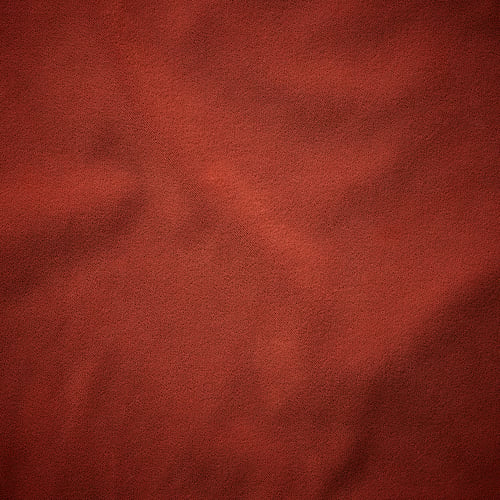 Bogaty brąz, fakturowana tkanina z bliska, prezentująca wysokiej jakości, materiał z recyklingu.