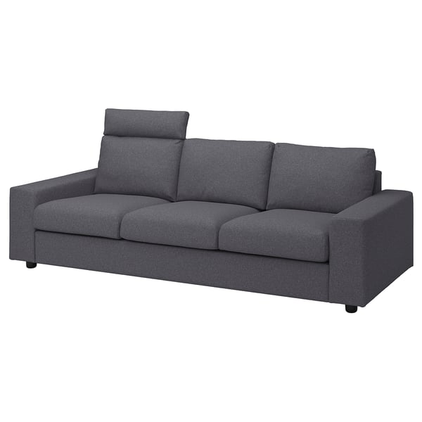 Szara nowoczesna sofa, VIMLE, prostokątny kształt, ciemna tapicerka, czyste linie, pluszowe poduszki.
