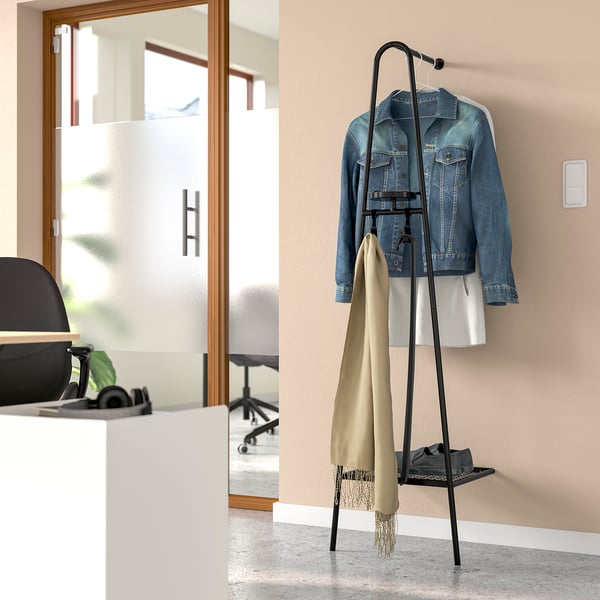 Black ÄLGANÄS coat rack with hooks, shoe shelf, and key tray for playful, practical storage.