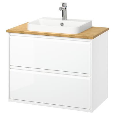 The ÄNGSJÖN bathroom vanity in white a bamboo countertop, a square ceramic basin, and two drawers with minimalist design for storage.