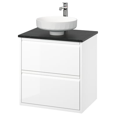 Modern white wall-mounted bathroom vanity with sleek black countertop and round white basin.
