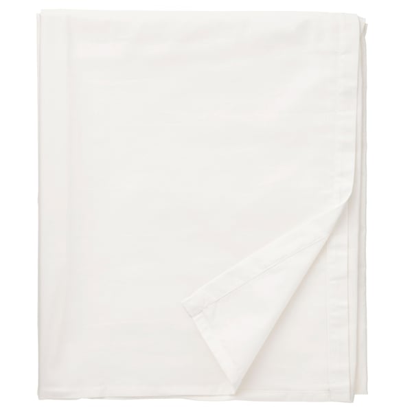 Folded white organic cotton flat sheet, neatly stacked, pure, crisp edges.