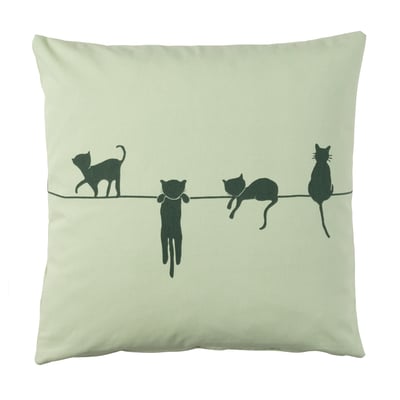 Greenish square pillow with black cat silhouettes walking on a line.
