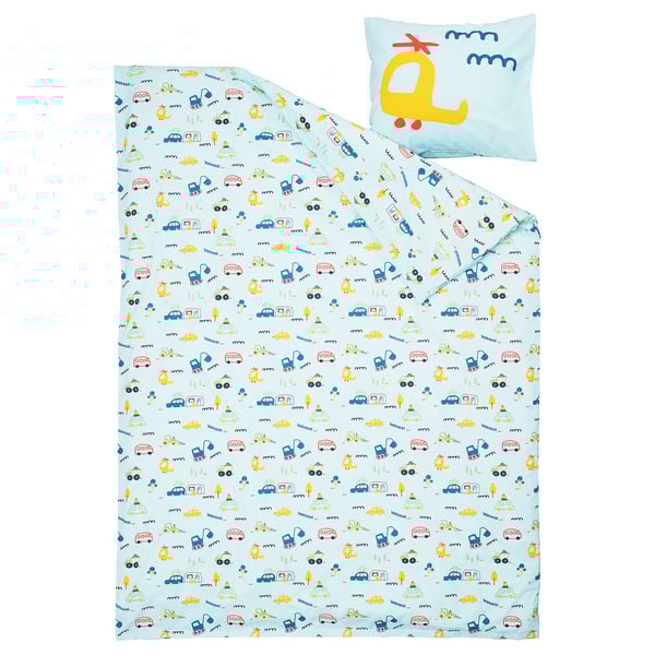 Childrens bedding set with blue, yellow, and multicoloured vehicle patterns on a light blue cotton background, including a blanket and a pillow.