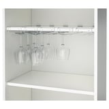 Wine glass holder underneath a shelf, saving space and keeping glasses dust-free.