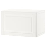 A white BESTÅ cabinet, a simple and versatile storage unit with a rectangular shape, designed for various spaces.