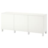 Its an off-white BESTÅ cabinet with minimalist design, featuring three doors and square legs.