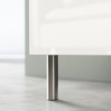 Modern white tv stand leg, cylindrical, brushed metal, part of BESTÅ series.