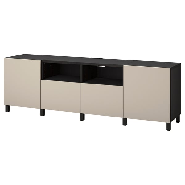 An off-white, large BESTÅ tv bench with a sleek, rectangular design, featuring multiple compartments and soft-close drawers.