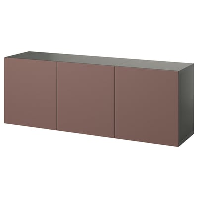 Modern BESTÅ wall unit with 3 dark red doors, sleek design, flat top.