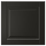Black square cabinet drawer front with beveled panel design, smooth lacquered surface.