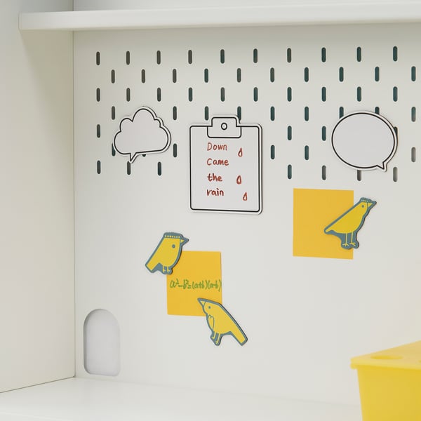 Whiteboard with 6 magnets for writing & organization.