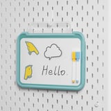 Small, turquoise BÖNSYRSA holder with magnetic whiteboard. Shows drawings, hello text, and pens. Angled, foldable, and fits tablets up to 13.