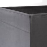 Close-up of gray fabric storage box with neat stitching, showing quality material and craftsmanship.