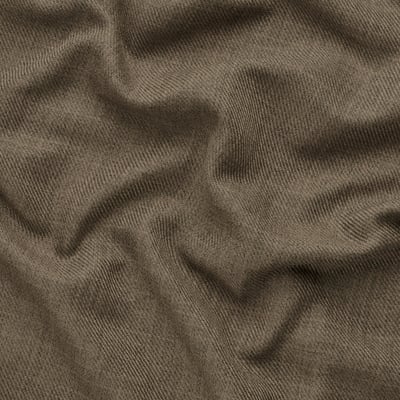 Close-up of pleated, high-quality fabric showcasing subtle texture and tone-on-tone coloration.