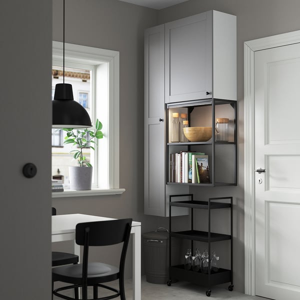 Modern grey ENHET storage unit with shelves and closed cabinet.