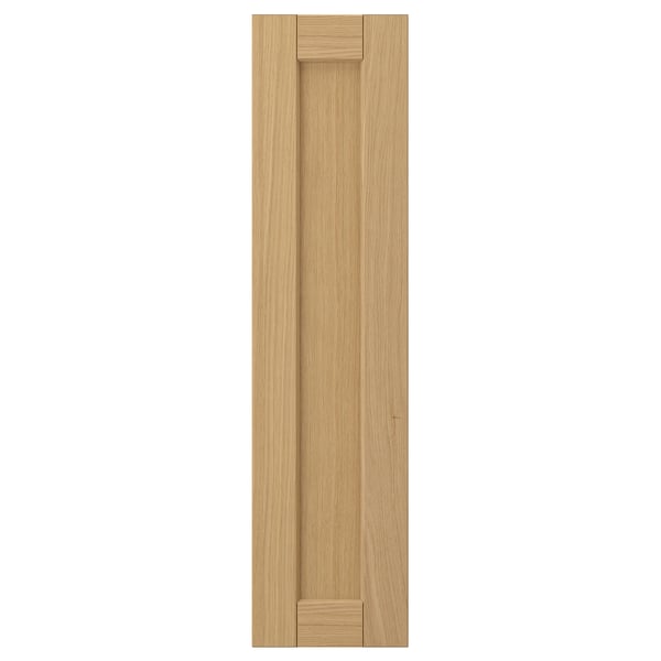 Forsbaka kitchen cabinet in warm oak veneer, rectangular with beveled edges, natural wood finish.