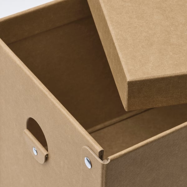 Recycled cardboard box with handle and lid.