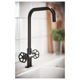 Black GAMLESJÖN kitchen tap with industrial design, featuring a high spout for easy cleaning. Made of brass with a metallic finish.