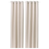 GINSTMOTT beige curtains: two light, sleek panels with silver eyelets, designed for modern décor.
