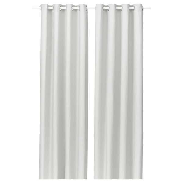 Image shows white GINSTMOTT curtains with eyelets, simple and sleek design, made from recycled polyester for sustainability and privacy.