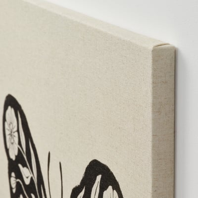 Black butterfly with white floral wings, printed on rustic canvas.