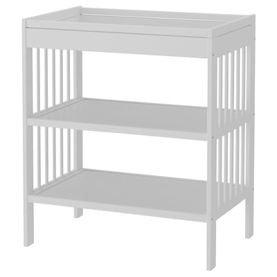 A white GULLIVER changing table, featuring three shelves for storage, a smooth top surface, and sturdy vertical wooden slats.