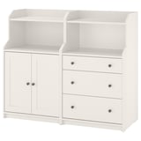 A white HAUGA storage unit with cabinets and drawers, combining open and closed storage in a traditional style.