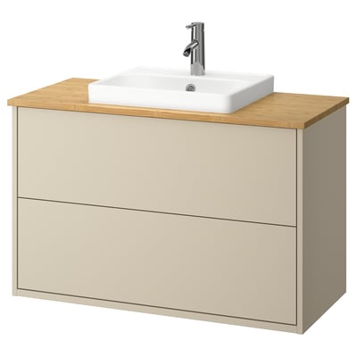 HAVBÄCK beige bathroom cabinet with bamboo countertop, white sink, minimalist design.