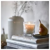 HÖSTAGILLE Scented candle in glass, Pear clear glass, 35 hr