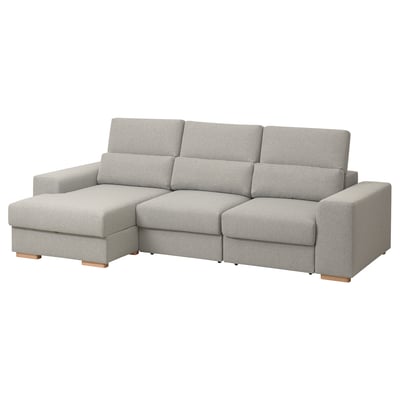 Modern grey l-shaped sofa, light wood legs, high back, adjustable headrests.