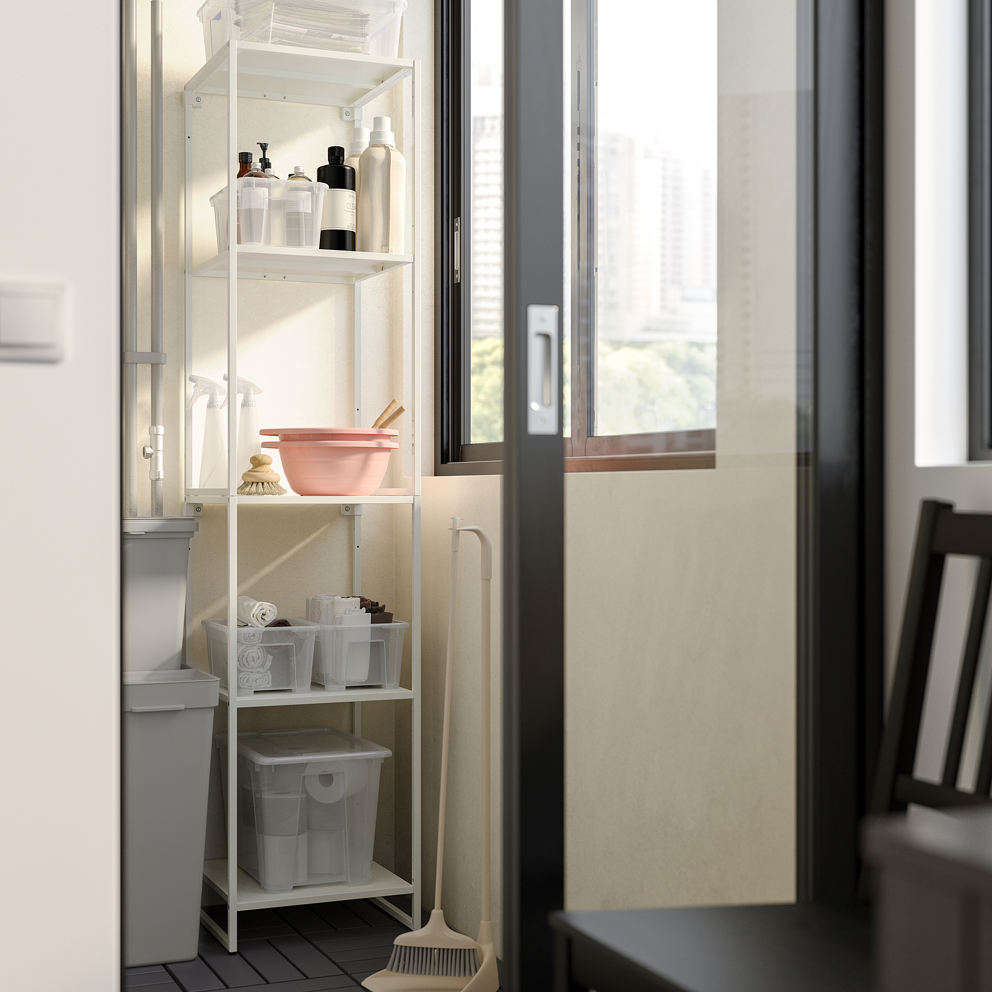 Subset of JOSTEIN white metal storage shelves in laundry room.