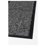 A high-quality black door mat with a textured, recycled polyester surface, designed for durability and easy cleaning.