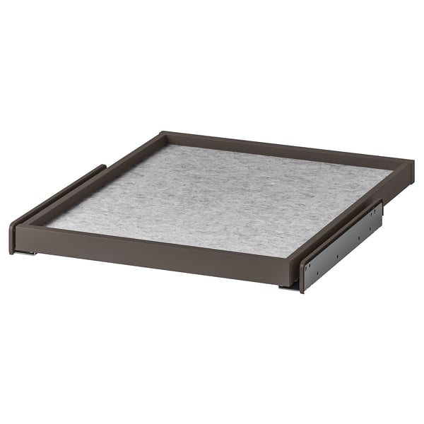 A gray KOMPLEMENT pull-out tray with a felt drawer mat for organizing items.