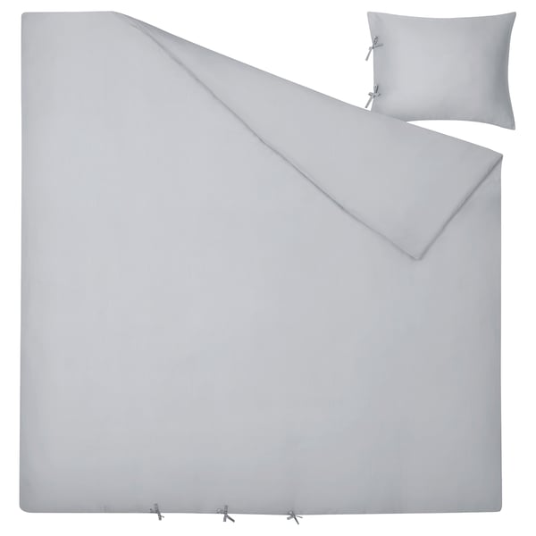 Light grey silky smooth bedding set with lustrous sateen-woven lyocell fabric, featuring decorative ribbons, a concealed pocket, and two pillowcases.