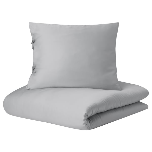 Light grey quilt cover set, silk-like lyocell fabric, folded with ties.