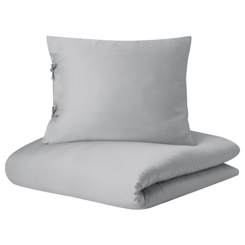 Light grey quilt cover set, silk-like lyocell fabric, folded with ties.