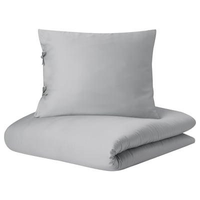 Light grey quilt cover set, silk-like lyocell fabric, folded with ties.