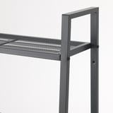 A high-quality metal shelf with a mesh-like top surface, supported by sturdy vertical beams with visible screws ensuring stability.