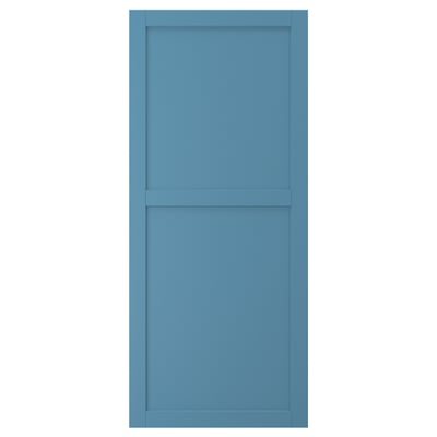A blue LERHYTTAN door with wooden framing and a birch panel.