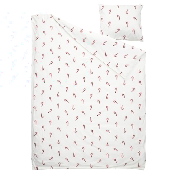 White bedding set with red candy cane prints; includes duvet and pillowcase; smooth cotton material.